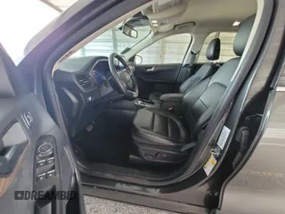 2020 Ford Escape Titanium Hybrid with VIN 1FMCU0DZ2LUB82013, listed as a IAAI auction lot 42727391 with 92,623 mi miles and . Bid and sale history available at DreamBid. Image 10.