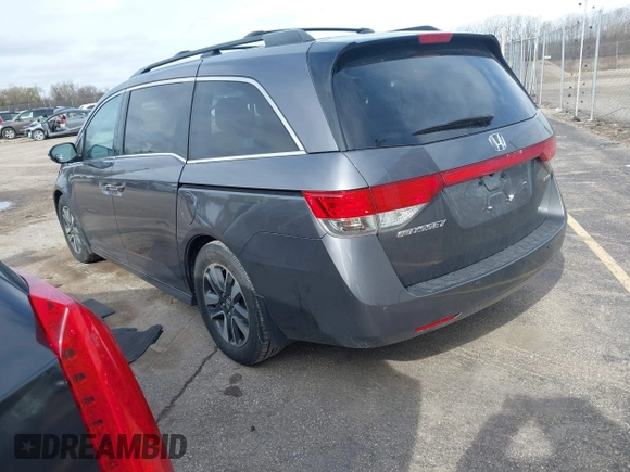 2016 Honda Odyssey Touring Elite z VIN 5FNRL5H99GB072860, wystawiony jako IAAI lot #42157603 z przebiegiem 221 449 mil mil oraz . Historia ofert i sprzedaży dostępna na DreamBid. Obrazek 3.