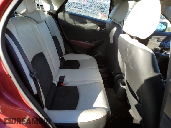 2018 Mazda CX-3 Grand Touring z VIN JM1DKFD75J0319224, wystawiony jako Copart lot #87504495 z przebiegiem 47 466 mil mil oraz Szkody całkowita. Historia ofert i sprzedaży dostępna na DreamBid. Obrazek 10.