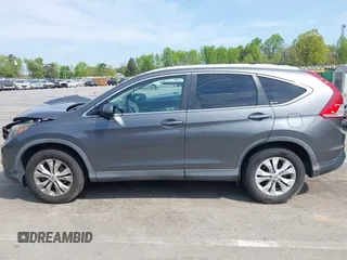 2012 Honda CR-V EX-L with VIN 2HKRM4H71CH605205, listed as a IAAI auction lot 42016555 with 68,110 mi miles. Bid and sale history available at carsss.com. Image 14.