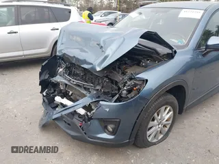 2015 Mazda CX-5 Touring with VIN JM3KE4CY1F0545305, listed as a IAAI auction lot 41234599 with 92,791 mi miles. Bid and sale history available at carsss.com. Image 17.