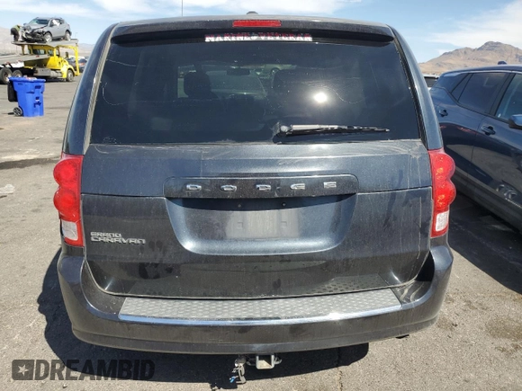 2013 Dodge Grand Caravan SE with VIN 2C4RDGBG8DR741359, listed as a Copart auction lot 52810065 with 103,735 mi miles and Salvage Title. Bid and sale history available at DreamBid. Image 6.