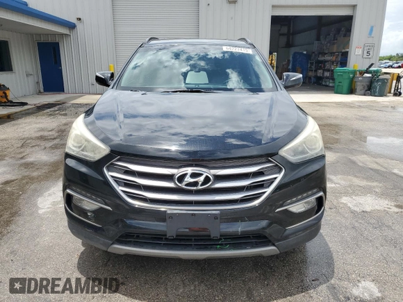 2017 Hyundai Santa Fe 2.4L with VIN 5NMZUDLB8HH048454, listed as a Copart auction lot 64727415 with 82,828 mi miles and Salvage title. Bid and sale history available at DreamBid. Image 5.