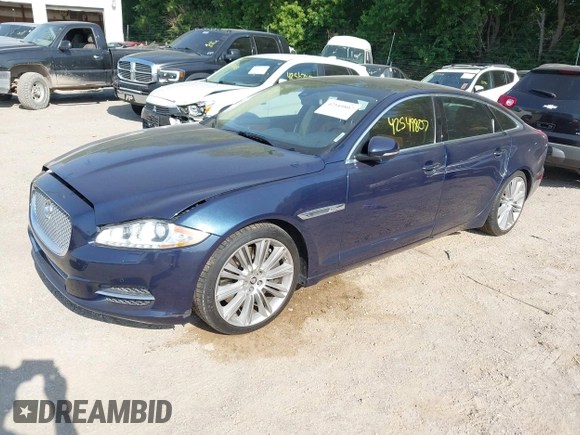 2013 Jaguar XJ Supercharged with VIN SAJWA2GE8DMV43164, listed as a IAAI auction lot 42549807 with 59,744 mi miles and . Bid and sale history available at DreamBid. Image 2.