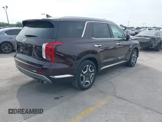 2023 Hyundai Palisade Limited z VIN KM8R54GE0PU517573, wystawiony jako IAAI lot #41870400 z przebiegiem 11 477 mil mil oraz . Historia ofert i sprzedaży dostępna na DreamBid. Obrazek 4.