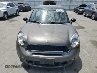2011 MINI Countryman S with VIN WMWZC5C5XBWL55516, listed as a Copart auction lot 63239235 with 137,545 mi miles and Salvage title. Bid and sale history available at DreamBid. Image 5.