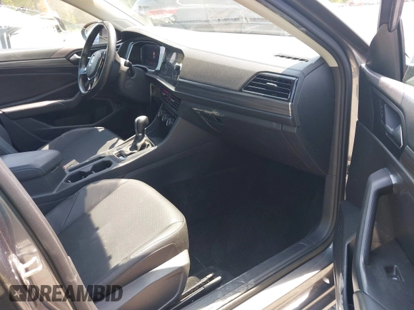 2019 Volkswagen Jetta SEL z VIN 3VWE57BU0KM110267, wystawiony jako IAAI lot #42161272 z przebiegiem 63 955 mil mil oraz . Historia ofert i sprzedaży dostępna na DreamBid. Obrazek 5.
