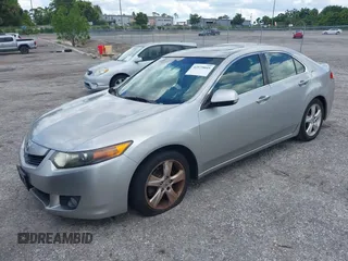 2010 Acura TSX with VIN JH4CU2F66AC022656, listed as a IAAI auction lot 42579045 with 222,313 mi miles and . Bid and sale history available at DreamBid. Image 2.