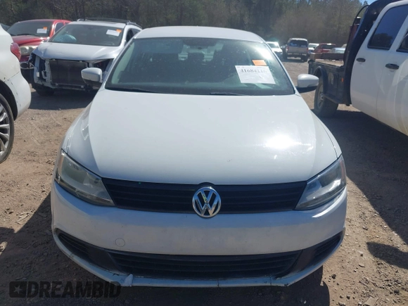2014 Volkswagen Jetta SE z VIN 3VWD17AJ5EM422832, wystawiony jako IAAI lot #41684216 z przebiegiem 103 940 mil mil oraz . Historia ofert i sprzedaży dostępna na DreamBid. Obrazek 6.