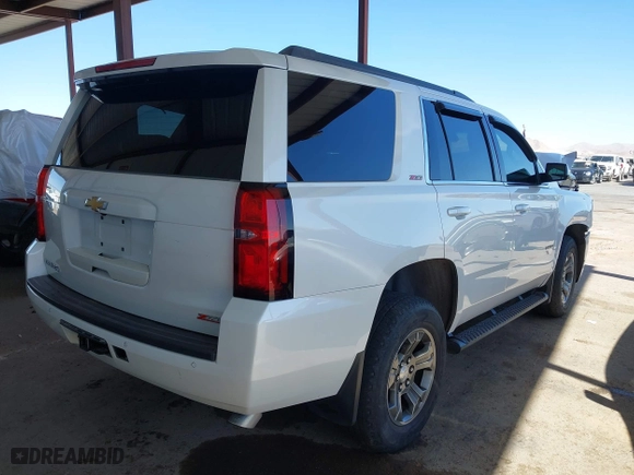 2018 Chevrolet Tahoe LT with VIN 1GNSKBKC3JR179578, listed as a IAAI auction lot 41491535 with 57,048 mi miles. Bid and sale history available at carsss.com. Image 4.