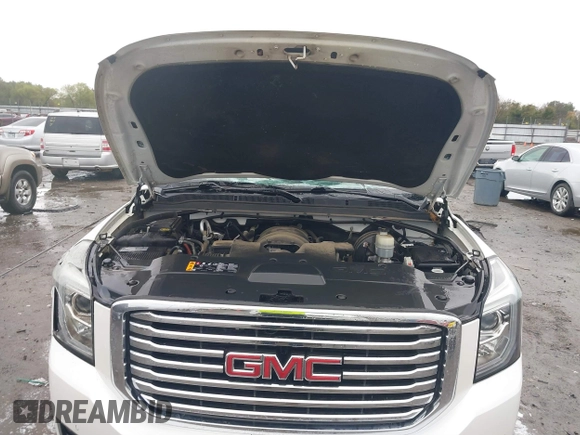 2018 GMC Yukon SLT with VIN 1GKS1BKC8JR392851, listed as a IAAI auction lot 40744741 with 117,028 mi miles. Bid and sale history available at carsss.com. Image 10.