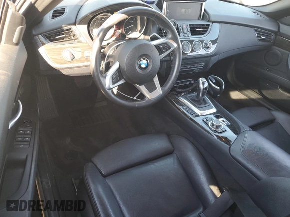 2016 BMW Z4 sDrive28i with VIN WBALL5C51G5A20067, listed as a Copart auction lot 43067105 with 37,409 mi miles and Salvage Title. Bid and sale history available at carsss.com. Image 8.