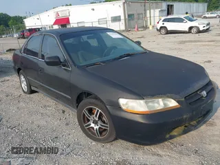 1999 Honda Accord LX z VIN 1HGCG5641XA008694, wystawiony jako IAAI lot #42385438 z przebiegiem 323 971 mil mil oraz . Historia ofert i sprzedaży dostępna na DreamBid. Obrazek 1.