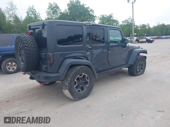 2016 Jeep Wrangler Unlimited Rubicon with VIN 1C4HJWFG6GL346862, listed as a IAAI auction lot 42441610 with 94,227 mi miles and . Bid and sale history available at DreamBid. Image 4.