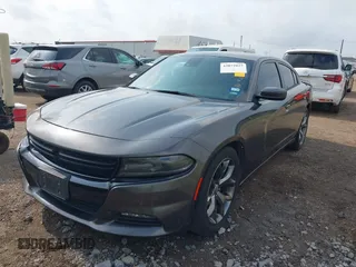 2015 Dodge Charger SXT with VIN 2C3CDXHG7FH886502, listed as a IAAI auction lot 42072027 with 105,034 mi miles and . Bid and sale history available at DreamBid. Image 6.
