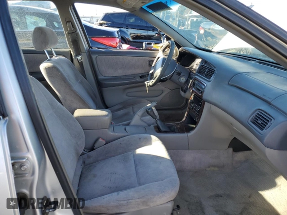 1999 Nissan Altima XE with VIN 1N4DL01D3XC204946, listed as a Copart auction lot 87009404 with 184,731 mi miles and Non Repairable. Bid and sale history available at carsss.com. Image 7.
