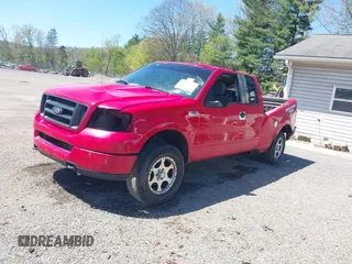 2005 Ford F-150 STX with VIN 1FTRX14W35NC00694, listed as a IAAI auction lot 42112128 with 157,067 mi miles and . Bid and sale history available at carsss.com. Image 2.
