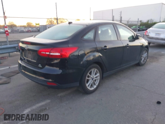 2017 Ford Focus SE with VIN 1FADP3FE7HL298287, listed as a IAAI auction lot 41870698 with Not Provided miles and . Bid and sale history available at carsss.com. Image 4.