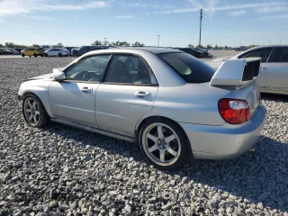 2004 Subaru Impreza Sedan (Natl) WRX STi w/Gold Wheels with VIN JF1GD70634L504794, listed as a Copart auction lot 47649275 with 139,006 mi miles and Non Repairable. Bid and sale history available at carsss.com. Image 2.