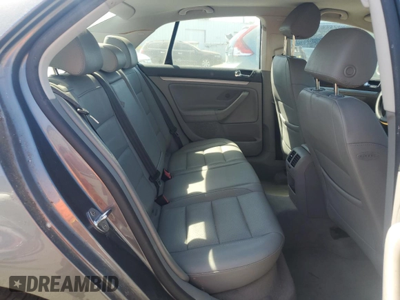 2005 Volkswagen Jetta 2.5L z VIN 3VWRG71K95M619046, wystawiony jako Copart lot #63351685 z przebiegiem 95 052 mil mil oraz Czysty tytuł • Clean title. Historia ofert i sprzedaży dostępna na DreamBid. Obrazek 10.