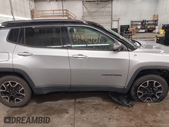 2019 Jeep Compass Trailhawk with VIN 3C4NJDDB8KT667863, listed as a IAAI auction lot 41944001 with 80,635 mi miles and . Bid and sale history available at DreamBid. Image 14.