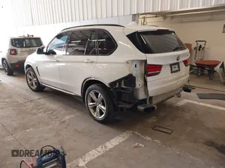 2015 BMW X5 xDrive50i z VIN 5UXKR6C56F0J76986, wystawiony jako IAAI lot #42079106 z przebiegiem 96 220 mil mil oraz . Historia ofert i sprzedaży dostępna na DreamBid. Obrazek 3.