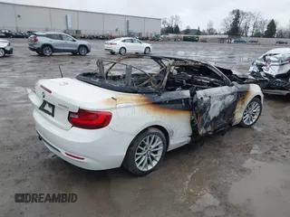 2016 BMW 2 Series 228i xDrive with VIN WBA1L9C56GV325558, listed as a IAAI auction lot 41833671 with 1 mi miles. Bid and sale history available at carsss.com. Image 4.