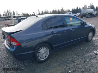 2009 Honda Civic Hybrid with VIN JHMFA36209S008939, listed as a IAAI auction lot 41798952 with 163,650 mi miles. Bid and sale history available at carsss.com. Image 4.