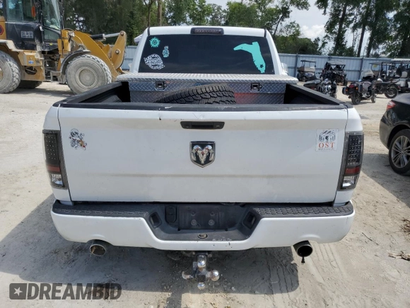 2014 Ram 1500 Express with VIN 3C6JR6AT2EG331453, listed as a Copart auction lot 58036025 with 204,576 mi miles and Salvage title. Bid and sale history available at DreamBid. Image 6.