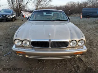 2002 Jaguar XJ with VIN SAJDA14C82LF48116, listed as a Copart auction lot 86444224 with 0 mi miles and Salvage Title. Bid and sale history available at carsss.com. Image 5.