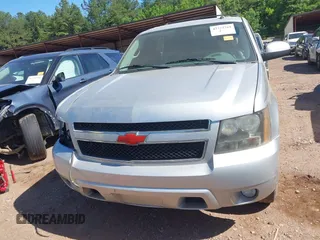 2014 Chevrolet Tahoe LT with VIN 1GNSCBE00ER147899, listed as a IAAI auction lot 42322761 with 299,342 mi miles and . Bid and sale history available at DreamBid. Image 12.