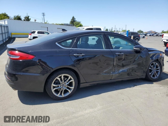2020 Ford Fusion SEL z VIN 3FA6P0CD5LR193714, wystawiony jako Copart lot #58540245 z przebiegiem 82 831 mil mil oraz Szkoda całkowita • Salvage title. Historia ofert i sprzedaży dostępna na DreamBid. Obrazek 3.