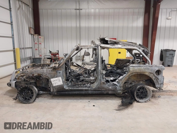 2021 Jeep Wrangler Unlimited Rubicon with VIN 1C4HJXFN7MW619113, listed as a IAAI auction lot 41879742 with Not provided miles and . Bid and sale history available at DreamBid. Image 13.