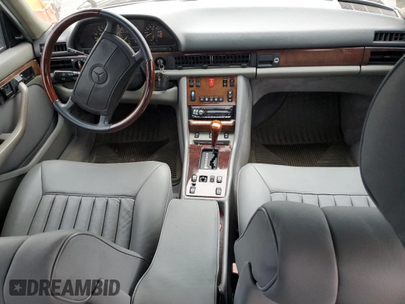 1987 Mercedes-Benz 560 with VIN WDBCA39D7HA322057, listed as a Copart auction lot 83717904 with 246,060 mi miles and Clean Title. Bid and sale history available at DreamBid. Image 8.