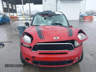2014 MINI Countryman S z VIN WMWZC5C57EWM17149, wystawiony jako IAAI lot #41246831 z przebiegiem 112 369 mil mil oraz . Historia ofert i sprzedaży dostępna na DreamBid. Obrazek 6.