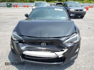 2014 Scion FR-S z VIN JF1ZNAA16E8702957, wystawiony jako Copart lot #58801915 z przebiegiem 114 656 mil mil oraz Szkoda całkowita • Salvage title. Historia ofert i sprzedaży dostępna na DreamBid. Obrazek 5.