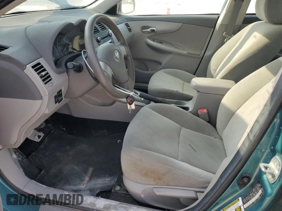 2010 Toyota Corolla with VIN 2T1BU4EEXAC381825, listed as a Copart auction lot 53634555 with 134,219 mi miles and Salvage Title. Bid and sale history available at carsss.com. Image 7.