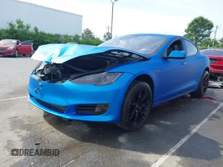 2013 Tesla Model S Performance with VIN 5YJSA1DP5DFP25345, listed as a IAAI auction lot 42288379 with 165,915 mi miles and . Bid and sale history available at DreamBid. Image 19.