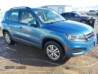 2017 Volkswagen Tiguan S with VIN WVGBV7AX4HK029852, listed as a IAAI auction lot 41654651 with 37,759 mi miles and . Bid and sale history available at DreamBid. Image 1.