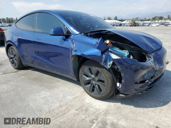2024 Tesla Model Y with VIN 7SAYGDED0RF102479, listed as a Copart auction lot 55431975 with 23,989 mi miles and Salvage title. Bid and sale history available at DreamBid. Image 4.