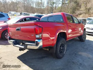 2020 Toyota Tacoma 4WD SR5 with VIN 3TMCZ5AN1LM327891, listed as a IAAI auction lot 41635848 with 26,131 mi miles. Bid and sale history available at carsss.com. Image 4.