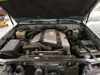 2004 Lexus LX 470 with VIN JTJHT00W843548361, listed as a Copart auction lot 76465204 with 257,543 mi miles and Salvage Title. Bid and sale history available at carsss.com. Image 12.