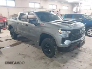 2024 Chevrolet Silverado 1500 LT Trail Boss with VIN 3GCUDFED9RG416593, listed as a IAAI auction lot 41896750 with 7,375 mi miles and . Bid and sale history available at DreamBid. Image 1.