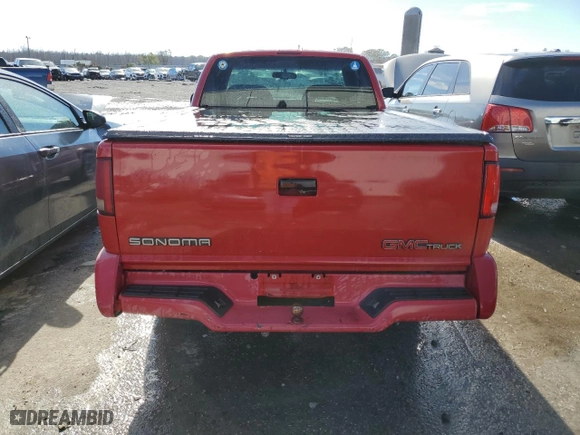 1997 GMC Sonoma SLS with VIN 1GTCS19XXVK506122, listed as a Copart auction lot 82875544 with 148,914 mi miles and Salvage Title. Bid and sale history available at carsss.com. Image 6.