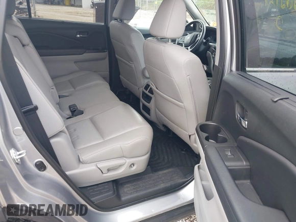 2021 Honda Pilot EX-L with VIN 5FNYF6H50MB063465, listed as a IAAI auction lot 42160636 with 28,595 mi miles and . Bid and sale history available at DreamBid. Image 8.