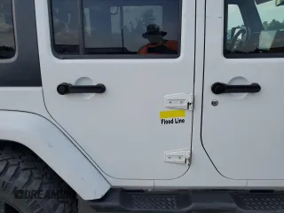 2013 Jeep Wrangler Unlimited Sahara with VIN 1C4BJWEG4DL536694, listed as a Copart auction lot 57714035 with 146,257 mi miles and Salvage title. Bid and sale history available at DreamBid. Image 13.