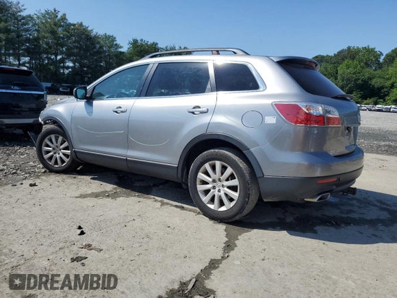 2010 Mazda CX-9 Grand Touring с VIN JM3TB3MV7A0221845, выставлен на аукционе Copart как лот 60701045 с пробегом 226 889 миль миль и Списание • Salvage title. История ставок и продаж доступна на DreamBid. Изображение 2.