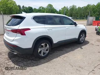 2023 Hyundai Santa Fe SE with VIN 5NMS14AJ9PH630176, listed as a IAAI auction lot 42202536 with 26,624 mi miles and . Bid and sale history available at DreamBid. Image 4.