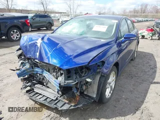 2014 Ford Fusion SE with VIN 1FA6P0H70E5363079, listed as a IAAI auction lot 41987310 with 128,629 mi miles and . Bid and sale history available at DreamBid. Image 2.