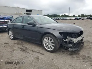 2016 Audi A6 Premium with VIN WAUFFAFC4GN056873, listed as a Copart auction lot 64122565 with 42,581 mi miles and Salvage title. Bid and sale history available at DreamBid. Image 4.